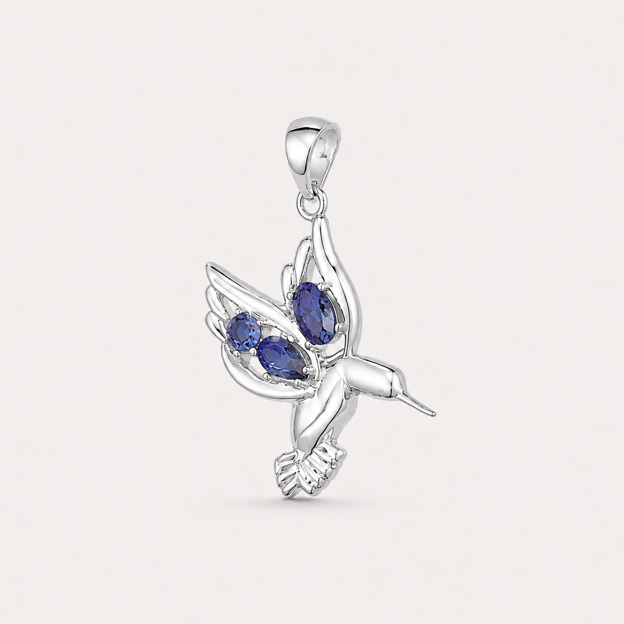 The Hummingbird Iolite Pendant