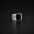 ZIVORI men's signet ring in 925 sterling silver featuring a polished black onyx stone and detailed side engravings.