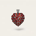 ZIVORI heart pendant featuring a cluster of oval-cut red garnet gemstones set in 925 sterling silver with filigree bail