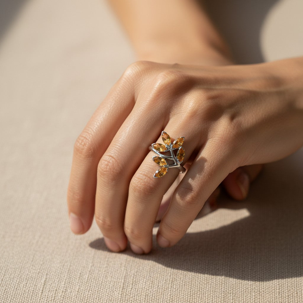 ZIVORI The Gilded Vine citrine ring featuring six marquise-cut stones in a sterling silver branch design on a hand.