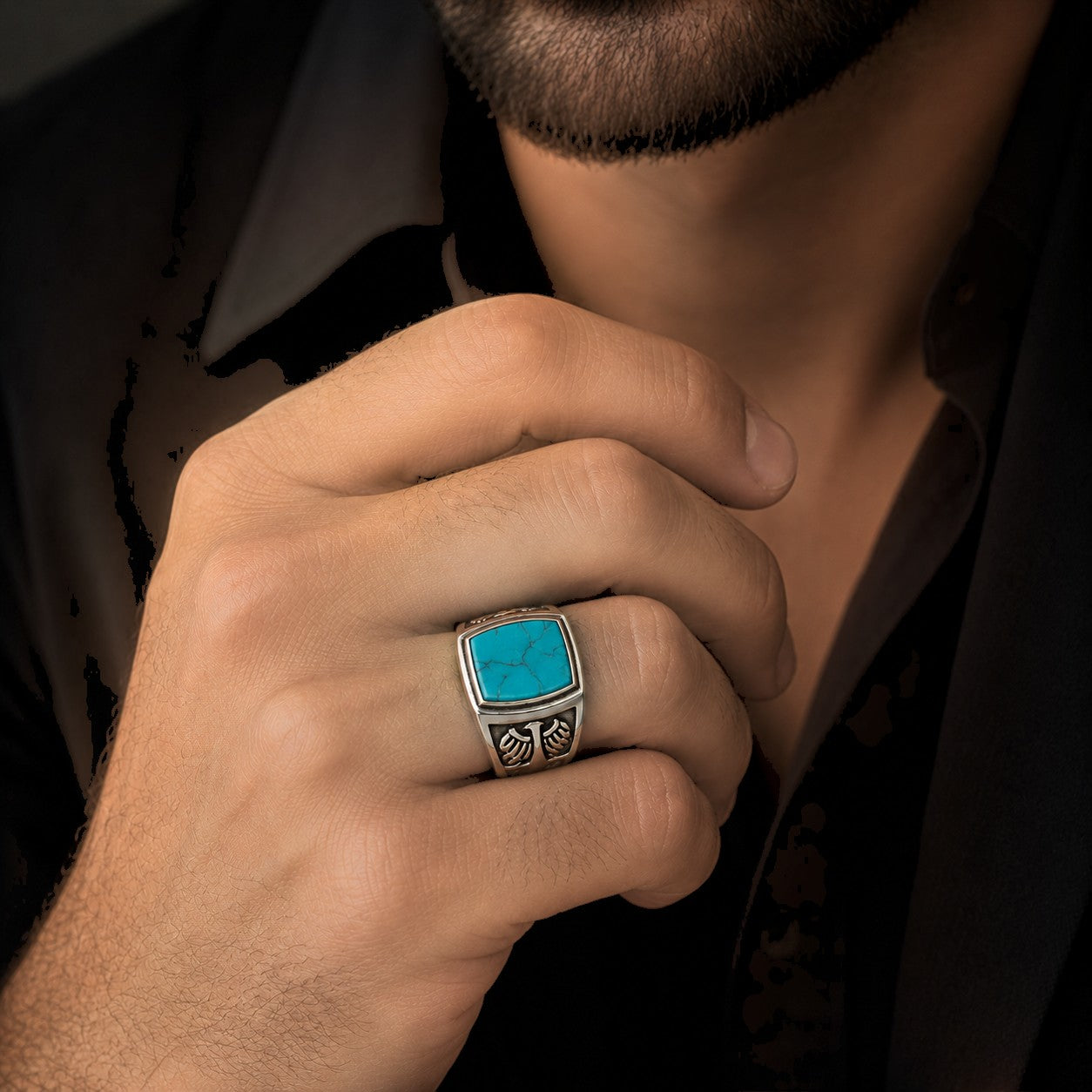 ZIVORI men's sterling silver signet ring featuring a natural turquoise stone and intricate eagle wing detailing.