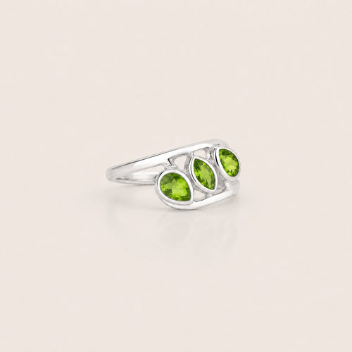 ZIVORI Verdant Trilogy ring featuring three natural peridot stones set in polished 925 sterling silver curves.
