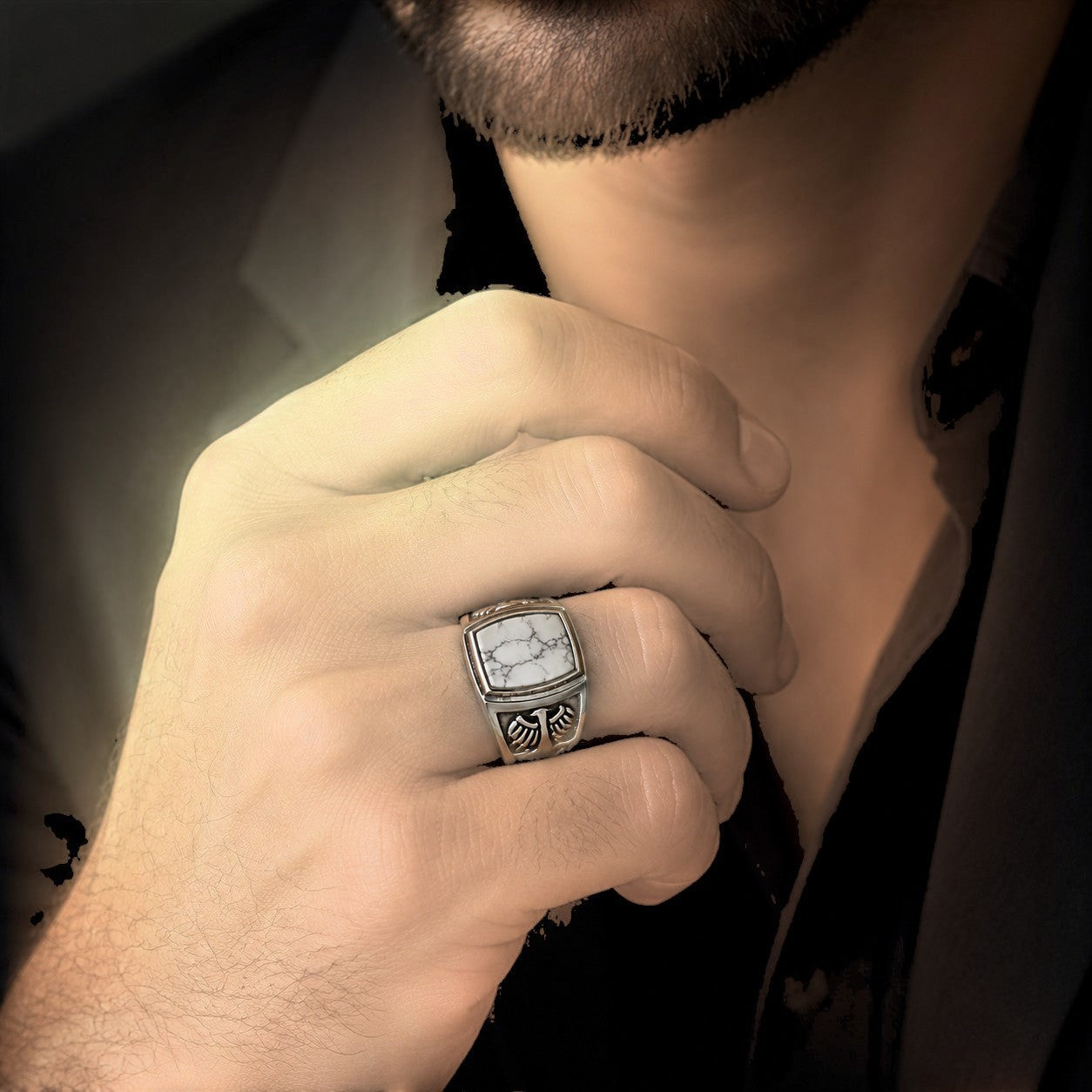 ZIVORI men's sterling silver signet ring featuring a natural white howlite stone with intricate handcrafted side details.