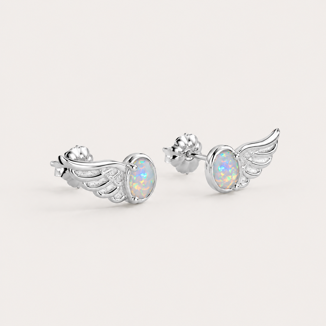 The Opal Fly Studs