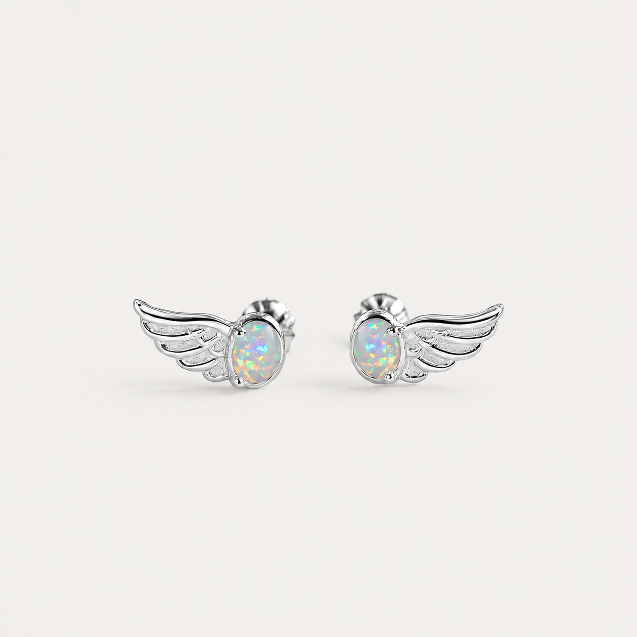 The Opal Fly Studs