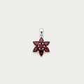 Star-shaped pendant with red gemstones on a white background